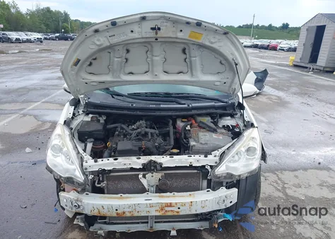 2014 Toyota Prius C One from USA, damaged, VIN JTDKDTB32E1566233